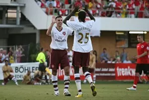 Arsenal v Genclerbirligi Collection: Robin van Persie celebrates scoring the 3rd Arsenal goal with Emmanuel Adebayor