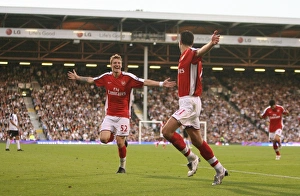 Bendtner Nicklas Collection: Robin van Persie celebrates scoring the Arsenal goal