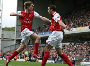 Robin van Persie celebrates scoring the Arsenal goal with Alex Hleb