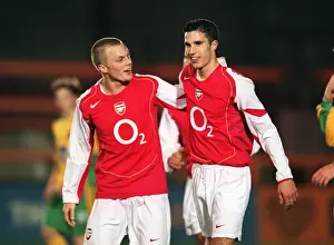 Robin van Persie celebrates scoring for Arsenal with Sebastian Larsson
