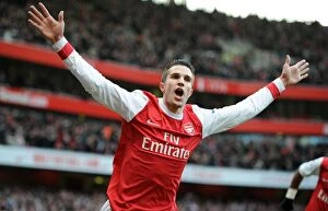 Arsenal v Wigan Athletic 2010-11 Collection: Robin van Persie celebrates scoring his and Arsenals 1st goal. Arsenal 3