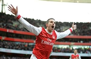 Images Dated 22nd January 2011: Robin van Persie celebrates scoring his and Arsenals 1st goal. Arsenal 3