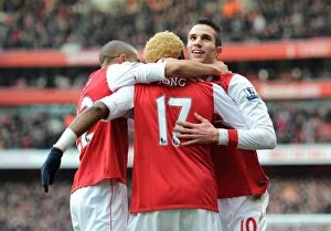 Arsenal v Wigan Athletic 2010-11 Collection: Robin van Persie celebrates scoring his and Arsenals 1st goal with Gael Clichy