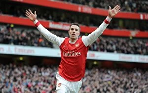 Arsenal v Wigan Athletic 2010-11 Collection: Robin van Persie celebrates scoring his and Arsenals 1st goal. Arsenal 3