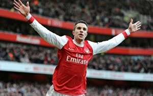 Images Dated 22nd January 2011: Robin van Persie celebrates scoring his and Arsenals 1st goal. Arsenal 3