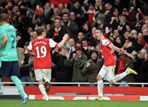 Images Dated 16th February 2011: Robin van Persie celebrates scoring Arsenals 1st goal with Jack Wilshere