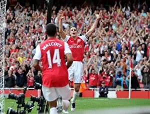 Robin van Persie celebrates scoring his and Arsenals 2nd goal, his 100th goal for Arsenal with Theo Walcott