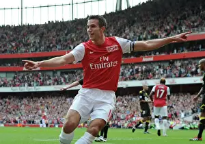 Robin van Persie celebrates scoring his and Arsenals 2nd goal, his 100th goal for Arsenal