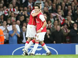 Robin van Persie celebrates scoring Arsenals 2nd goal with Cesc Fabregas