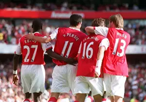 Robin van Persie celebrates scoring Arsenals 2nd goal with Emmanuel Eboue