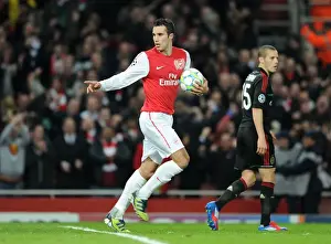 Robin van Persie celebrates scoring Arsenals 3rd goal. Arsenal 3: 0 AC Milan