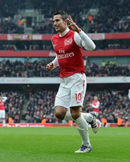 Robin van Persie celebrates scoring Arsenals 6th goal his 3rd. Arsenal 7: 1 Blackburn Rovers