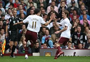 Images Dated 1st October 2007: Robin van Persie celebrates scoring Arsenals goal with Alex Hleb