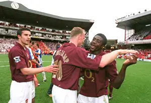 Robin van Persie, Dennis Bergkamp and Kolo Toure celebrate at the end of the match