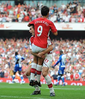 Arsenal v Wigan Athletic 2009-10 Collection: Robin van Persie and Eduardo celebrate the 3rd Arsenal