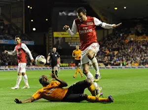 Wolverhampton Wanderers V Arsenal 2011-12 Prints: Robin van Persie Leaps Past Ronald Zubar: Wolverhampton Wanderers vs