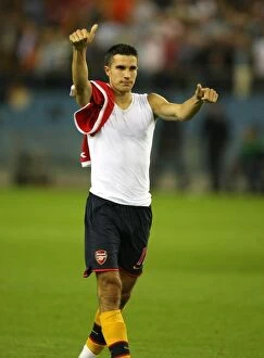 Images Dated 13th August 2008: Robin van Persie salutes the arsenal fans after the match
