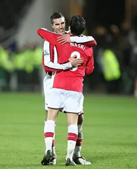 Robin van Persie and Samir Nasri celebrate the Arsenal