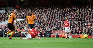 Arsenal v Wolverhampton Wanderers 2010-11 Gallery: Robin van Persie scores his and Arsenals 1st goal under pressure from Richard Stearman