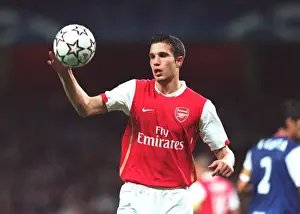 Arsenal V FC Porto Prints: Robin van Persie Scores in Arsenal's 2-0 Victory over FC Porto in UEFA Champions League Group Stage at Emirates