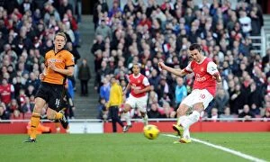 Images Dated 12th February 2011: Robin van Persie scores his and Arsenals 2nd goal under pressure from Christophe Berra