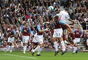 Images Dated 1st October 2007: Robin van Persie scores Arsenals goal under pressure from Lucas Neill (West Ham)