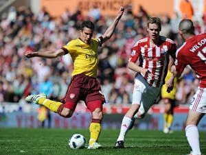 Images Dated 8th May 2011: Robin van Persie shoots past Asmir Begovic to score the Arsenal goal. Stoke City 3