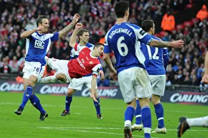 Robin van Persie shoots past Birmingham goalkeeper Ben Foster for the Arsenal goal