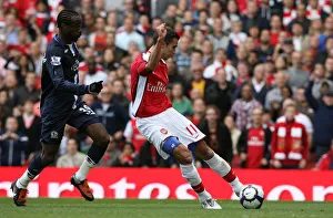 Images Dated 4th October 2009: Robin van Persie shoots past Blackburn goalkeeper Paul