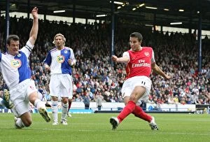 Images Dated 19th August 2007: Robin van Persie shoots past Blackburn goalkeeper Brad Friedel to score the Arsenal goal