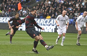 Images Dated 31st March 2008: Robin van Persie shoots past Bolton goalkeeper Ali Al Hasbi to score the 2nd Arsenal goal from