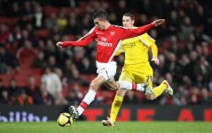 Images Dated 16th February 2009: Robin van Persie shoots past Cardiff goalkeeper Tom