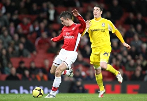 Images Dated 16th February 2009: Robin van Persie shoots past Cardiff goalkeeper Tom