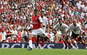 Arsenal v Fulham 2007-8 Collection: Robin van Persie shoots past Fulham goalkeeper Tony Warner to score the first Arsenal goal