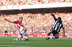 Robin van Persie shoots past Habib Beye to score the 2nd Arsenal goal