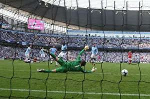 Robin van Persie shoots past Man City goalkeeper Shay