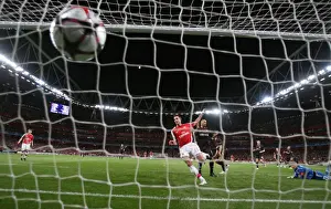 Arsenal V Olympiacos 2009-10 Prints: Robin van Persie shoots past Olypmiacos goalkeeper