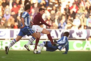 Wigan V Arsenal 2005-6 Prints: Robin van Persie shoots past Pascal Chimbonda (Wigna) to score Arsenals 1st goal