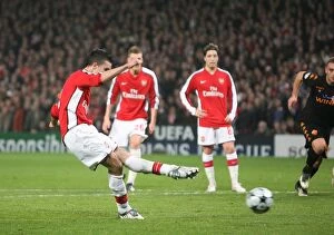 Arsenal v AS Roma 2008-9 Collection: Robin van Persie shoots past Roma goalkeeper Doni to