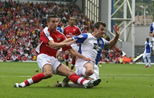 Blackburn Rovers v Arsenal 2008-9 Collection: Robin van Persie shoots past Ryan Nelson to score the