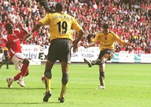 Charlton Athletic v Arsenal Collection: Robin van Persie shoots past Scott Carson to score the 1st Arsenal goal