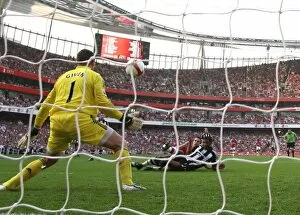 Robin van Persie shoots past Shay Given to score the 2nd Arsenal goal