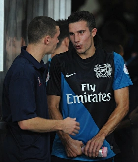 Malaysia XI v Arsenal Collection: Robin van Persie and Thomas Vermaelen (Arsenal). Malaysia XI 0: 4 Arsenal