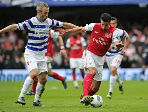 Robin van Persie vs. Shaun Derry: A Battle in the Premier League between Queens Park Rangers and Arsenal