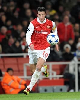 Images Dated 8th December 2010: Robin van Persie's Brace: Arsenal's 3-1 Victory Over Partizan Belgrade in UEFA Champions League