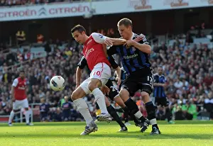 Robin van Persie's Brace: Arsenal's Thrilling 3-1 Victory Over Stoke City in the Premier League, 2011