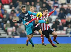 Robin van Persie's Brace Leads Arsenal to 2-1 Victory over Sunderland in Premier League