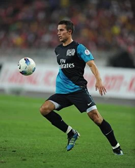 Images Dated 13th July 2011: Robin van Persie's Brilliant Performance: Arsenal Crushes Malaysia XI 4-0 at Bukit Jalil Stadium