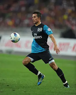 Robin van Persie's Brilliant Performance: Arsenal Crushes Malaysia XI 4-0 at Bukit Jalil Stadium