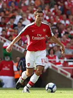 Robin van Persie's Brilliant Performance: Arsenal's 4-1 Victory Over Portsmouth in the Premier League